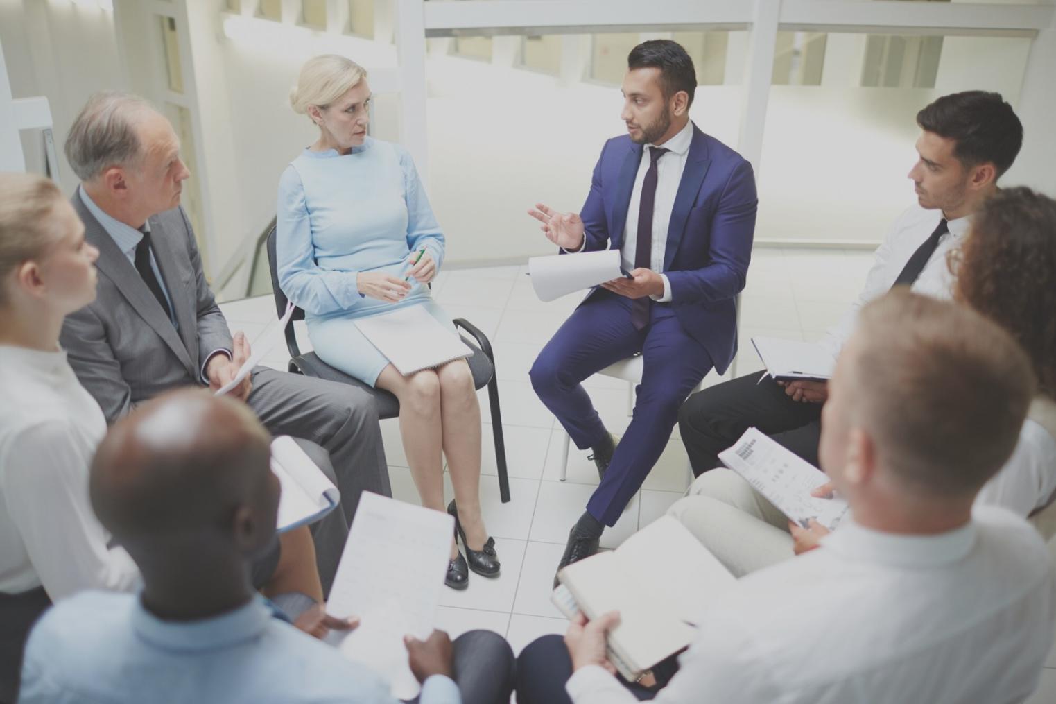 Person reviewing financial documents with thoughtful expression
